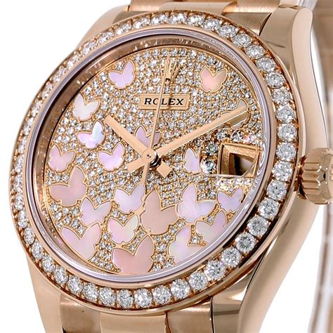 rolex butterfly rose gold watch.